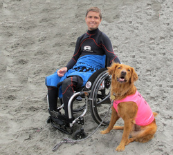 surf dog with disabled boy